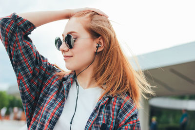 Portrait of woman wearing sunglasses