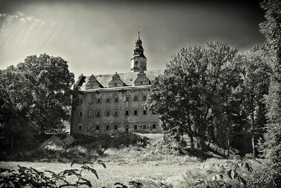 Building with trees in background