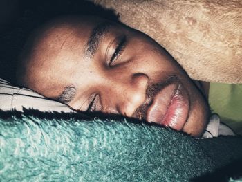 Close-up portrait of a young man sleeping