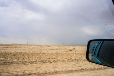 Car on road against sky