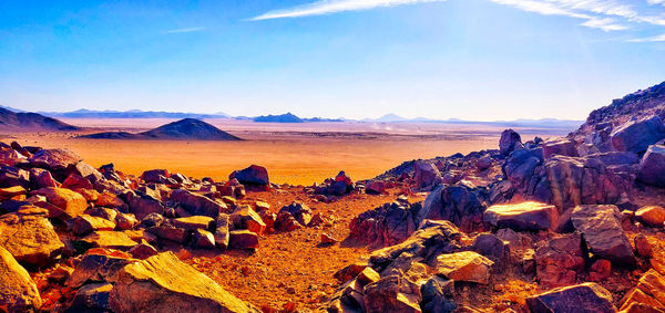 Scenic view of rock formations against sky