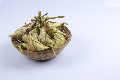 High angle view of wicker basket on table