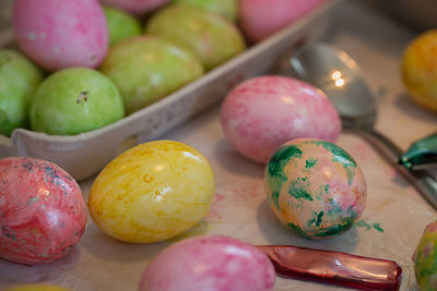 High angle view of multi colored eggs