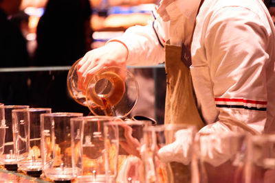 Close up of coffee being poured by a barista in starbucks reserve roastery shanghai