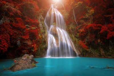 Waterfall in forest during autumn