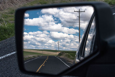 Road passing through forest