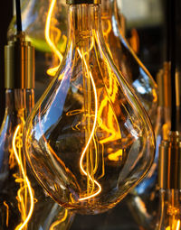 Close-up of illuminated light bulb