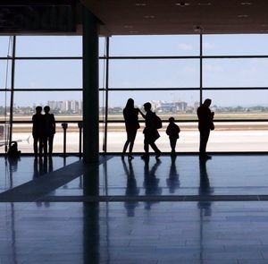 Silhouette people at airport