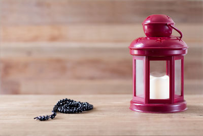 Close-up of strawberry in glass jar on table