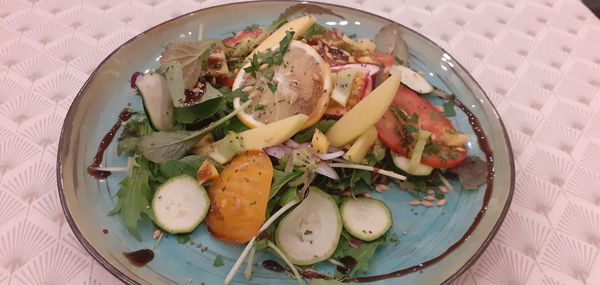 High angle view of vegetables in plate on table