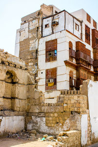 Low angle view of old building against sky