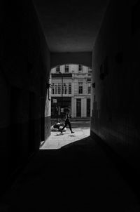 Man walking in corridor