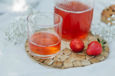 Close-up of strawberries in glass on table