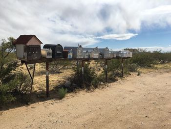 Mailboxes along countryside landscape