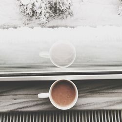 Close-up of coffee cup on table