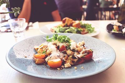 Close-up of meal served on table