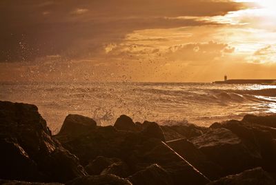 Scenic view of sea against sky during sunset