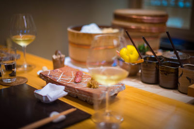 Close-up of wine in glass on table