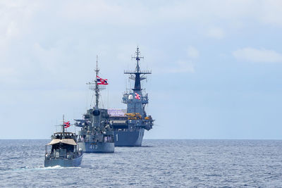 Ship in sea against sky