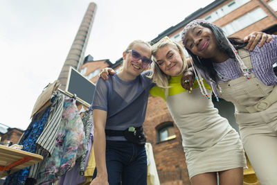 Young friends at yard sale