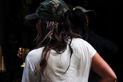 Rear view of woman wearing cap