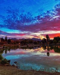 View of lake against cloudy sky