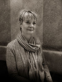 Portrait of smiling boy against wall