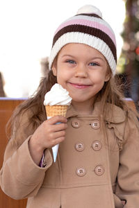 Happy child with ice cream cone