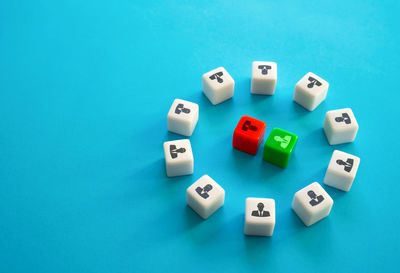 Close-up of dices on blue background