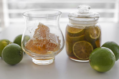 Close-up of fruits in jar on table