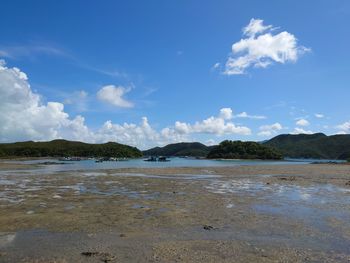 Scenic view of beach against sky