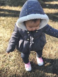 Close-up of cute girl standing outdoors