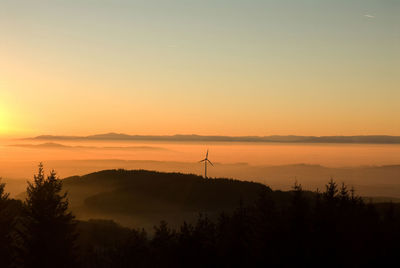 Scenic view of silhouette landscape against sky during sunset