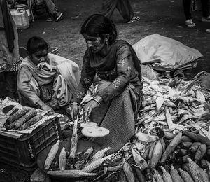 High angle view of people sitting at market
