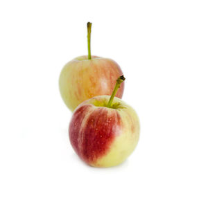 Close-up of apple against white background