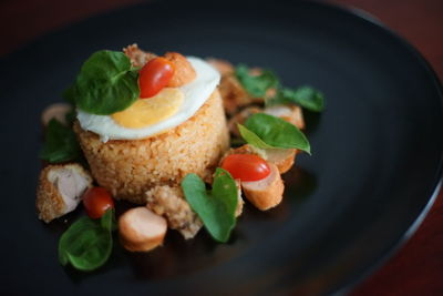 High angle view of breakfast served in plate on table