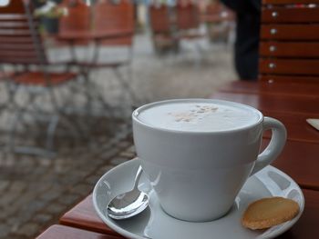 Close-up of coffee cup on table