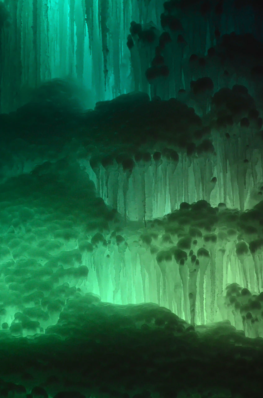 SCENIC VIEW OF CAVE IN WATER