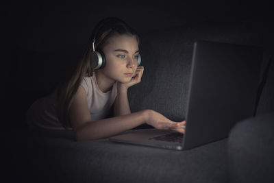 Portrait of girl using mobile phone