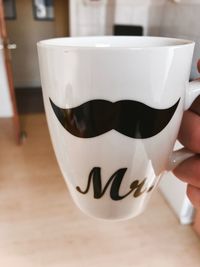 Close-up of coffee cup on table