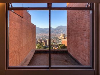 Buildings seen through window