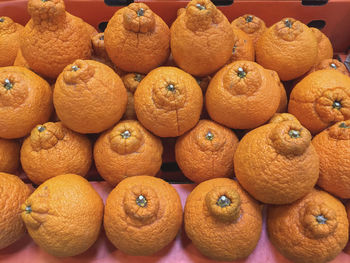 Full frame shot of oranges for sale at market