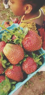 High angle view of raspberries in strawberries