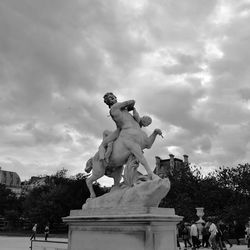 Low angle view of statue against sky