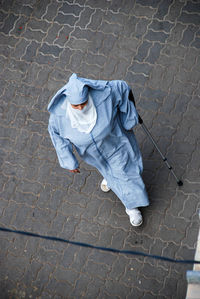 High angle view of person on footpath