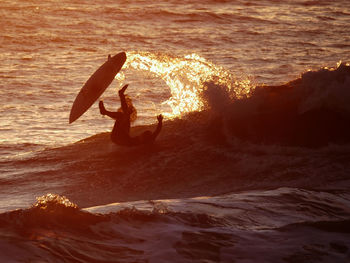 Man surfing in sea