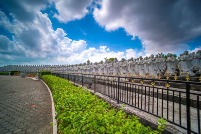 Panoramic view of footpath against sky