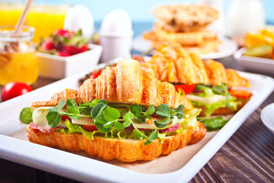 Close-up of sandwich served in plate on table