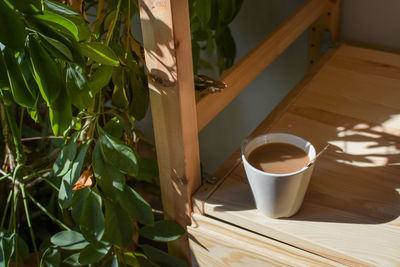 High angle view of coffee served on table