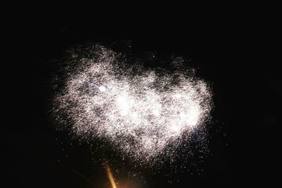 Firework display at night